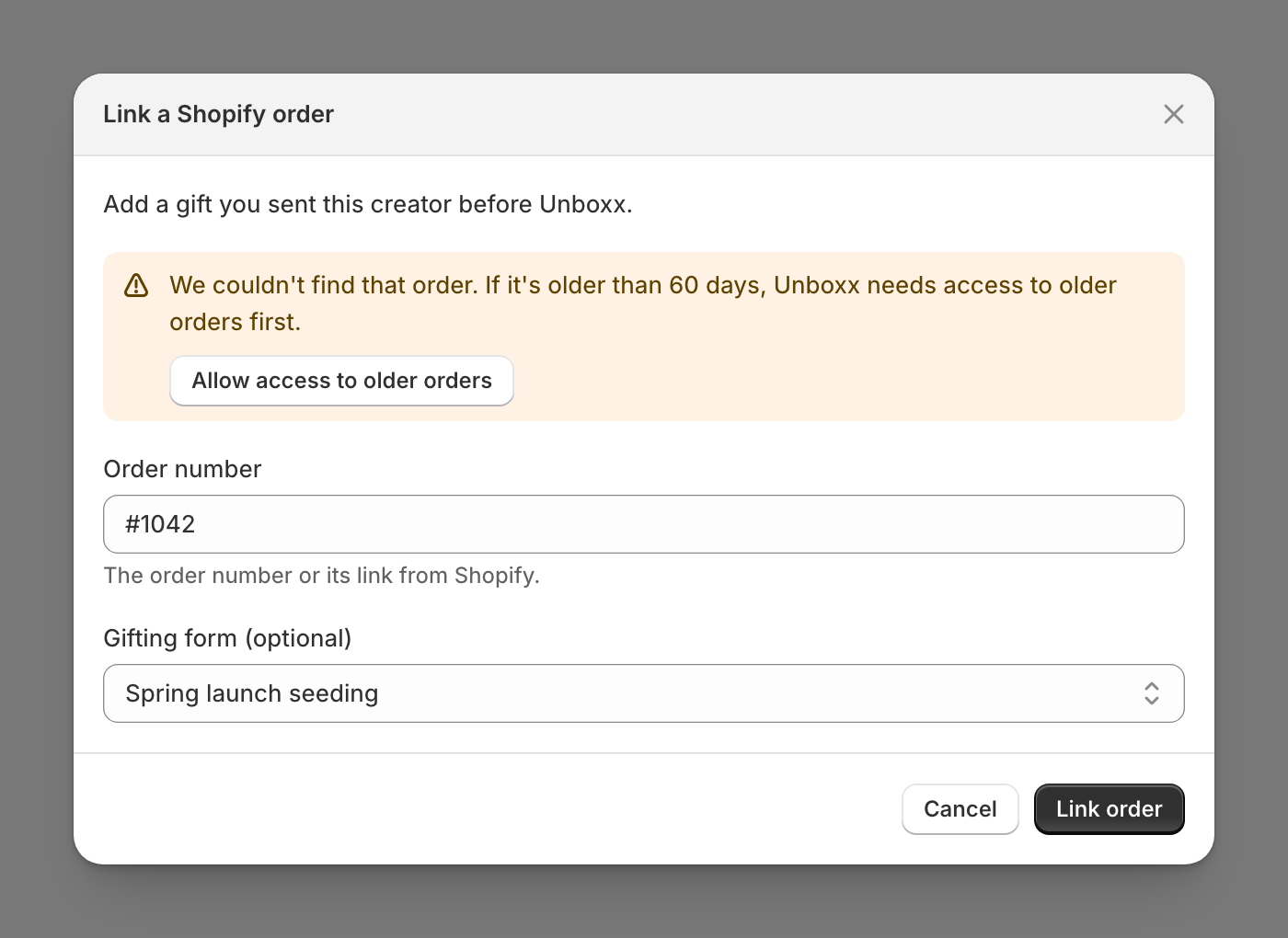The Link a Shopify order popup on a creator page